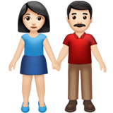 How Woman and Man Holding Hands: Light Skin Tone emoji looks on Apple.