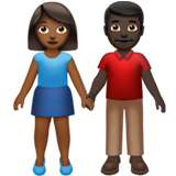 A quoi ressemblent les emoji Femme et homme se tenant la main: peau mate et peau foncée sur Apple.