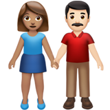 Hoe Man en vrouw hand in hand: getinte huidskleur, lichte huidskleur emoji eruit ziet op Apple.