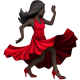 How Woman Dancing: Dark Skin Tone emoji looks on Apple.