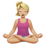 How Woman in Lotus Position: Medium-Light Skin Tone emoji looks on Apple.