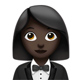 A quoi ressemblent les emoji Femme en smoking: peau foncée sur Apple.