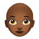 How Woman: Medium-Dark Skin Tone, Bald emoji looks on Apple.