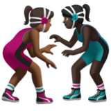 A quoi ressemblent les emoji Lutteuses : peau mate et peau foncée sur Apple.