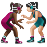 A quoi ressemblent les emoji Lutteuses : peau mate et peau claire sur Apple.