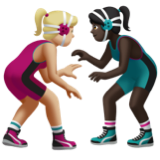 A quoi ressemblent les emoji Lutteuses : peau moyennement claire et peau foncée sur Apple.