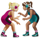 A quoi ressemblent les emoji Lutteuses : peau moyennement claire et peau légèrement mate sur Apple.