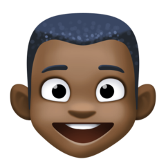 How Boy: Dark Skin Tone emoji looks on Facebook.