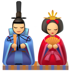 Bagaimana Japanese Dolls emoji terlihat di Facebook.