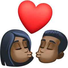 How Kiss: Dark Skin Tone emoji looks on Facebook.