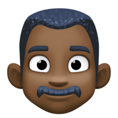 Bagaimana Man: Dark Skin Tone emoji terlihat di Facebook.