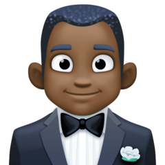 Bagaimana Man in Tuxedo: Dark Skin Tone emoji terlihat di Facebook.