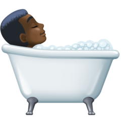 How Person Taking Bath: Dark Skin Tone emoji looks on Facebook.