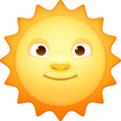 Bagaimana Sun with Face emoji terlihat di Facebook.