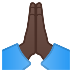 How Folded Hands: Dark Skin Tone emoji looks on Google.