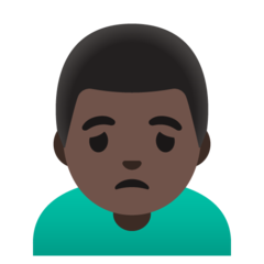 How Man Frowning: Dark Skin Tone emoji looks on Google.