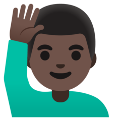 How Man Raising Hand: Dark Skin Tone emoji looks on Google.