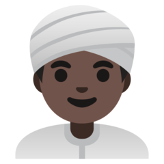 How Man Wearing Turban: Dark Skin Tone emoji looks on Google.