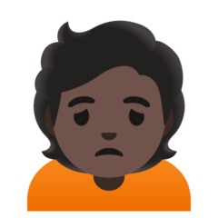 How Person Frowning: Dark Skin Tone emoji looks on Google.