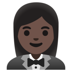 Bagaimana emoji Wanita berpakaian tuksedo: ton kulit gelap kelihatan di Google.