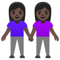 How Women Holding Hands: Dark Skin Tone emoji looks on Google.