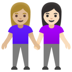 A quoi ressemblent les emoji Deux femmes se tenant la main: peau moyennement claire et peau claire sur Google.