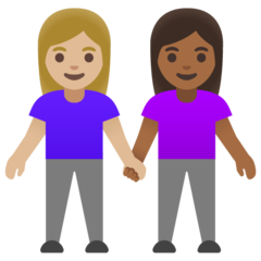 A quoi ressemblent les emoji Deux femmes se tenant la main: peau moyennement claire et peau mate sur Google.