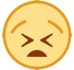 How Tired Face emoji looks on Htc.