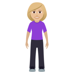 How Woman Standing: Medium-Light Skin Tone emoji looks on Joypixels.