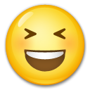 Bagaimana Grinning Squinting Face emoji terlihat di Lg.