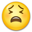 Como o emoji do Rosto cansado é exibido no Lg.