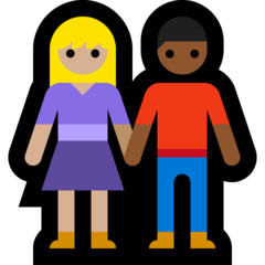 A quoi ressemblent les emoji Femme et homme se tenant la main: peau moyennement claire et peau mate sur Microsoft.