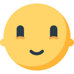 Bagaimana Slightly Smiling Face emoji terlihat di Mozilla.