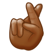 How Crossed Fingers: Medium-Dark Skin Tone emoji looks on Samsung.