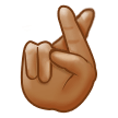 How Crossed Fingers: Medium Skin Tone emoji looks on Samsung.