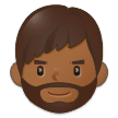 Hoe Man: donkergetinte huidskleur, baard emoji eruit ziet op Samsung.