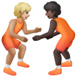 A quoi ressemblent les emoji Personnes faisant de la lutte : peau moyennement claire et peau foncée sur Samsung.