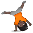 How Person Cartwheeling: Dark Skin Tone emoji looks on Samsung.