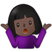 How Woman Shrugging: Dark Skin Tone emoji looks on Samsung.