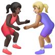 A quoi ressemblent les emoji Lutteuses : peau foncée et peau moyennement claire sur Samsung.