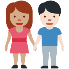 Come Uomo e donna che si tengono per mano: carnagione olivastra e carnagione chiara emoji appare su Twitter.