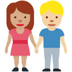 A quoi ressemblent les emoji Femme et homme se tenant la main: peau légèrement mate et peau moyennement claire sur Twitter.