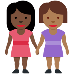 How Women Holding Hands: Dark Skin Tone, Medium-Dark Skin Tone emoji looks on Twitter.