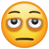 Hvordan Fjes med poser under øynene emoji ser ut på Whatsapp.