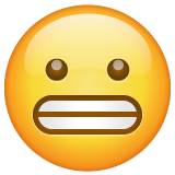 Bagaimana Grimacing Face emoji terlihat di Whatsapp.