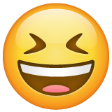 How Grinning Squinting Face emoji looks on Whatsapp.