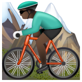 How Man Mountain Biking: Dark Skin Tone emoji looks on Whatsapp.