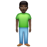 Bagaimana Man Standing: Dark Skin Tone emoji terlihat di Whatsapp.