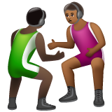A quoi ressemblent les emoji Lutteurs : peau foncée et peau mate sur Whatsapp.