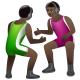 A quoi ressemblent les emoji Lutteurs : peau foncée sur Whatsapp.